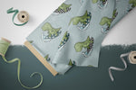 Lade das Bild in den Galerie-Viewer, Webware für Bermudashorts "Dino Surfing" seafoam 0,5 m