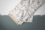 Lade das Bild in den Galerie-Viewer, Lycra "Beige Dinos" 0,5 m