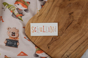 Kunstleder Patch "Schulkind" orange 7,2 x 3,5 cm