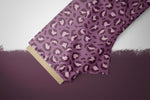 Lade das Bild in den Galerie-Viewer, Supersoft Premium BIO French Terry "Leopard Love" plum 0,5 m
